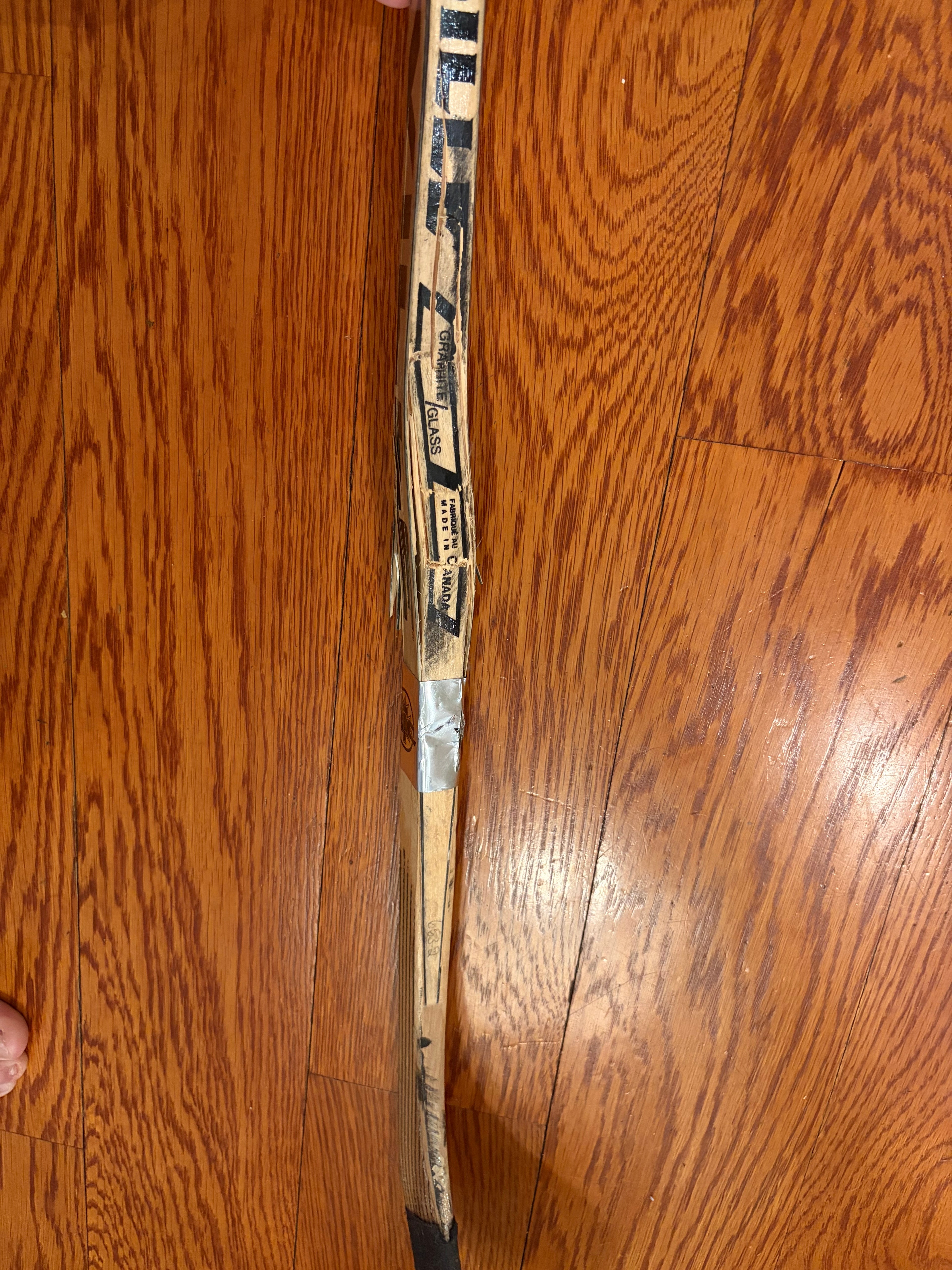 Pierre Turgeon Game used stick, signed and authenticated by him