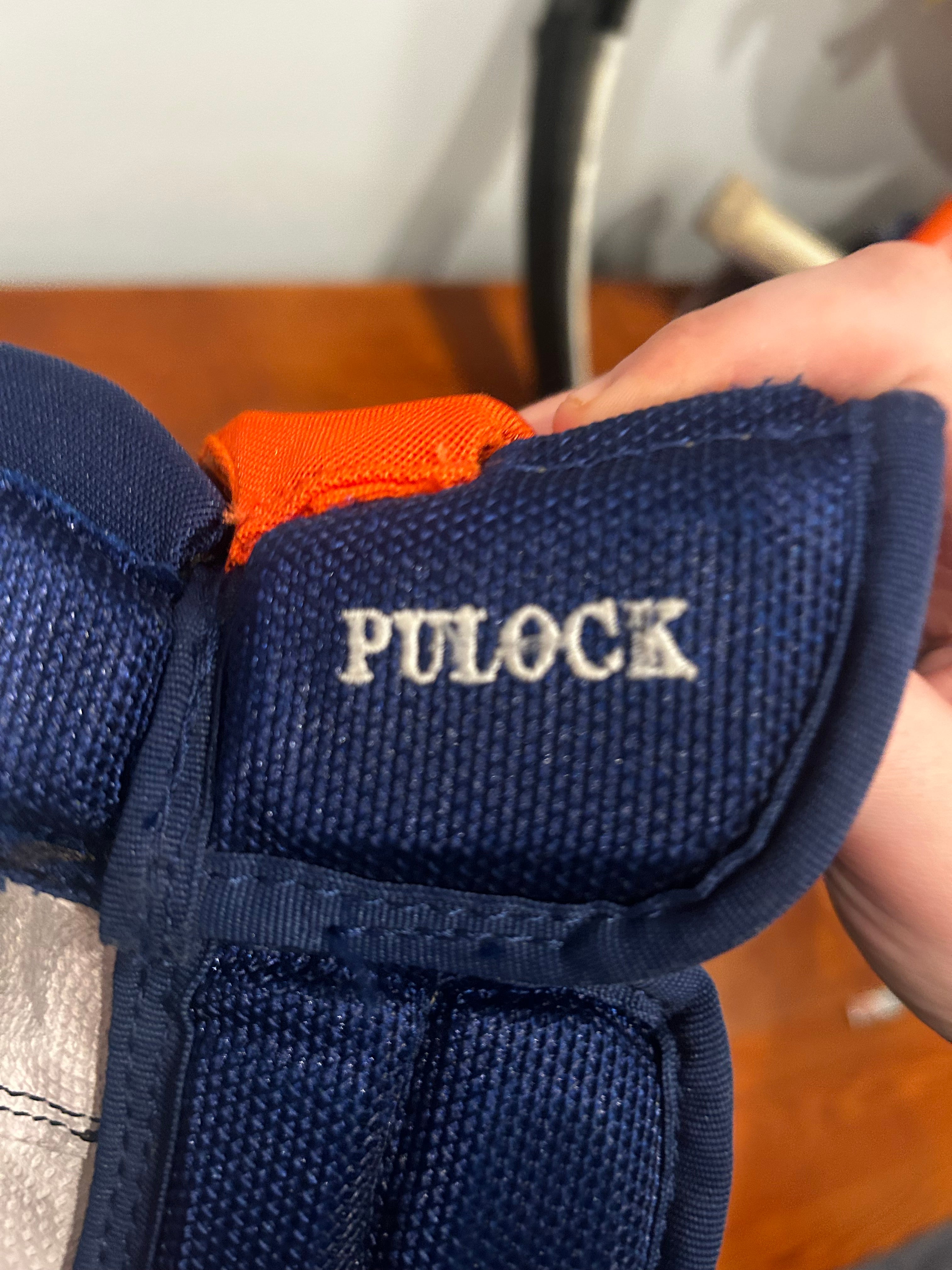 Ryan Pulock game used gloves signed