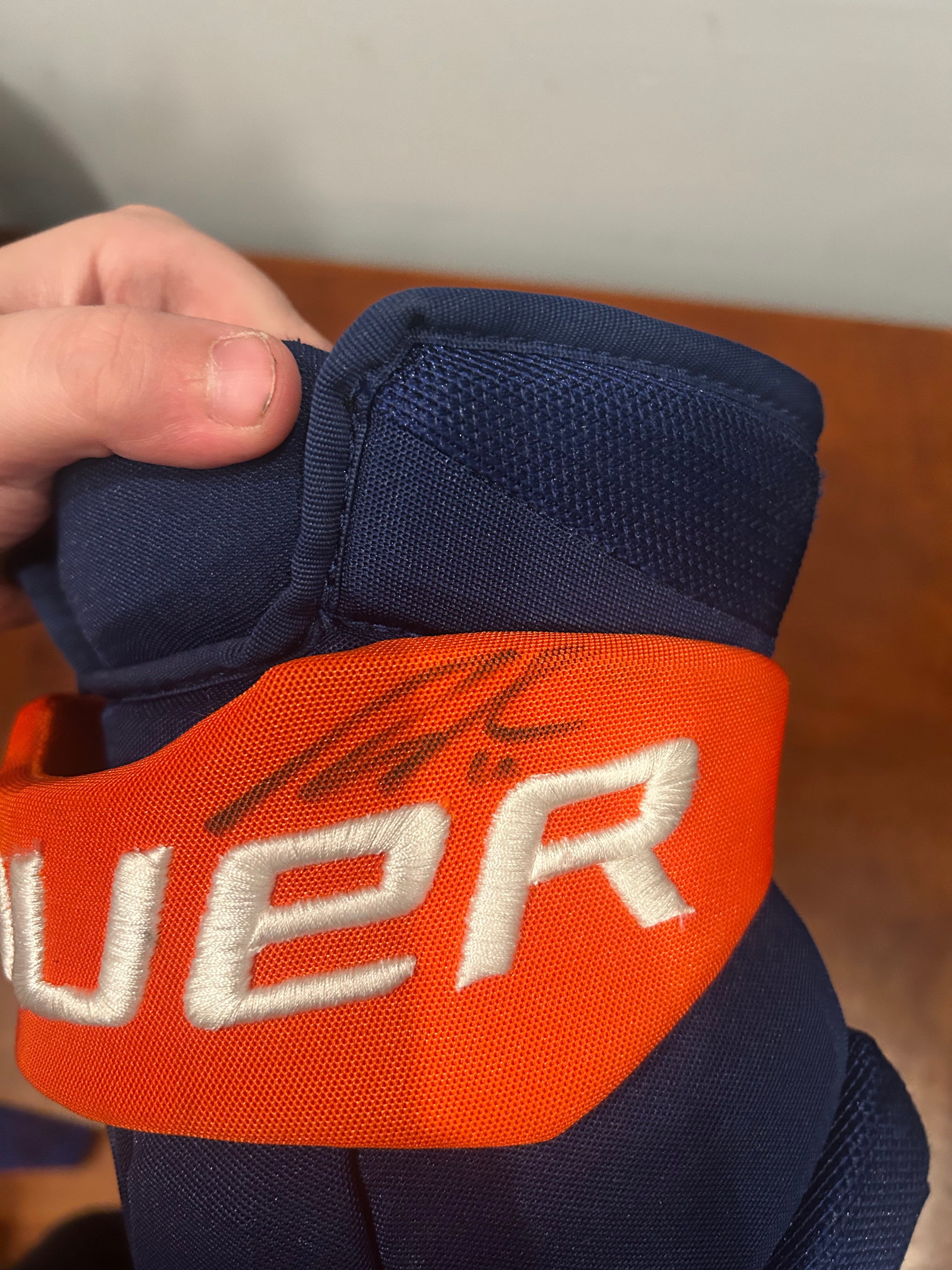 Ryan Pulock game used gloves signed