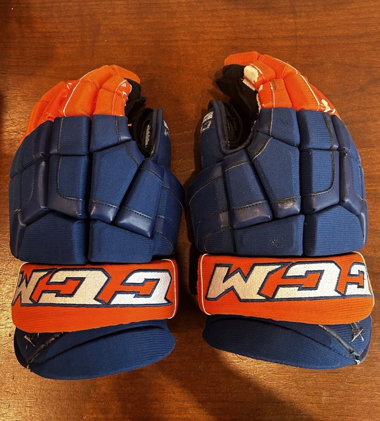 John Tavares game used gloves with hat-trick puck.