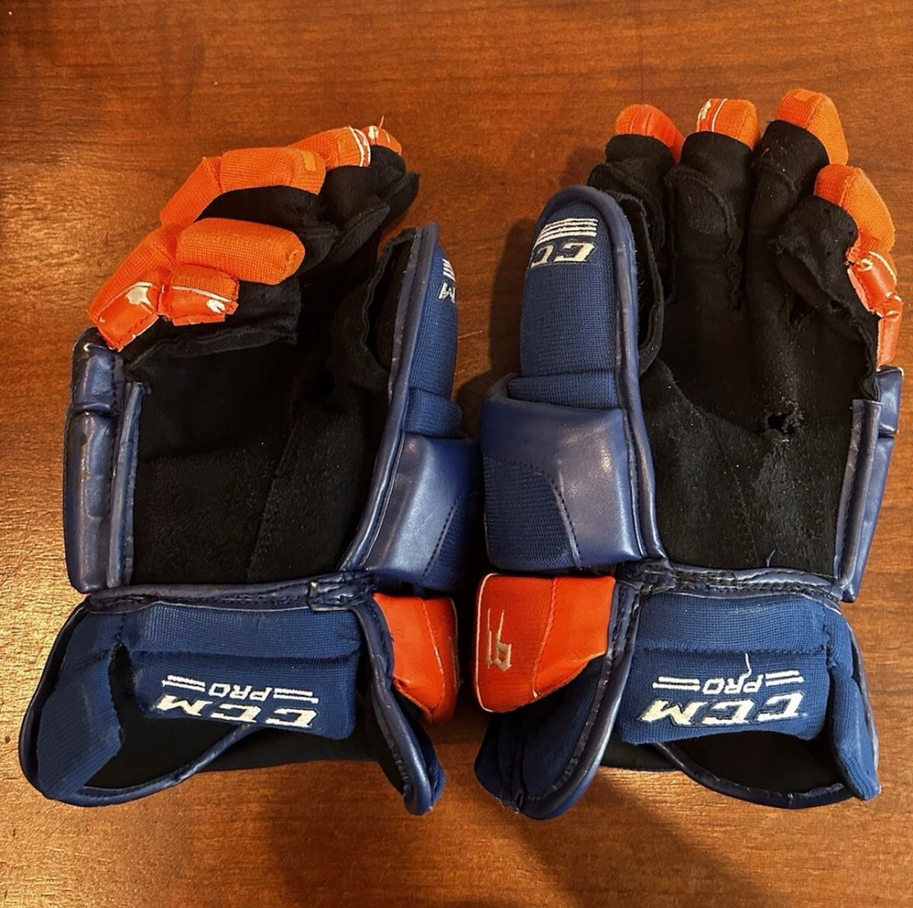 John Tavares game used gloves with hat-trick puck.