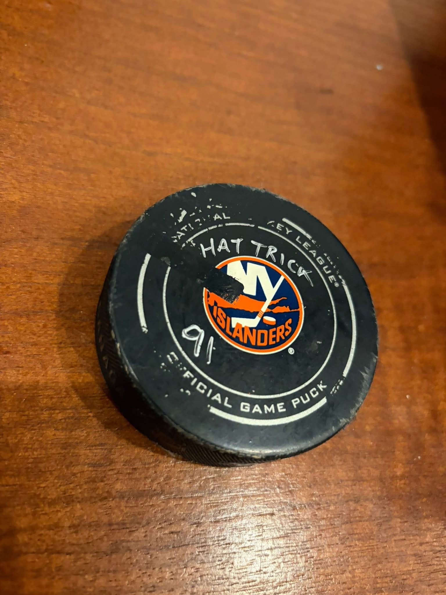 John Tavares game used gloves with hat-trick puck.