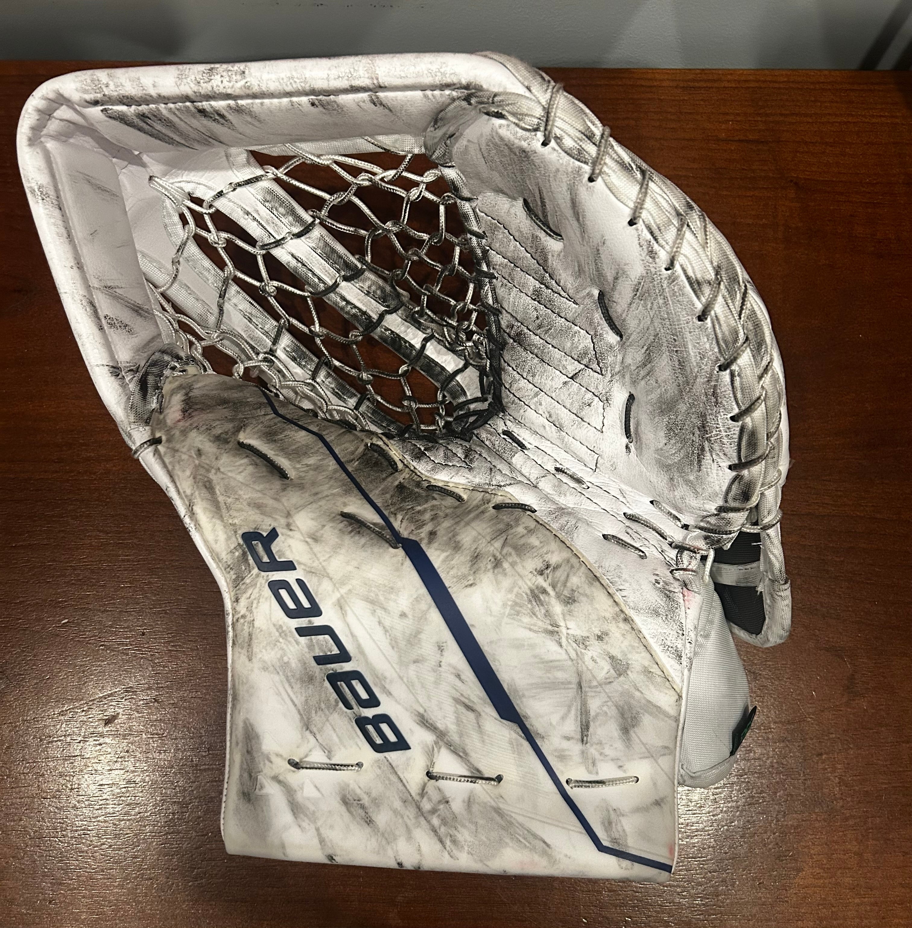 Sorokin game worn glove with LOA.